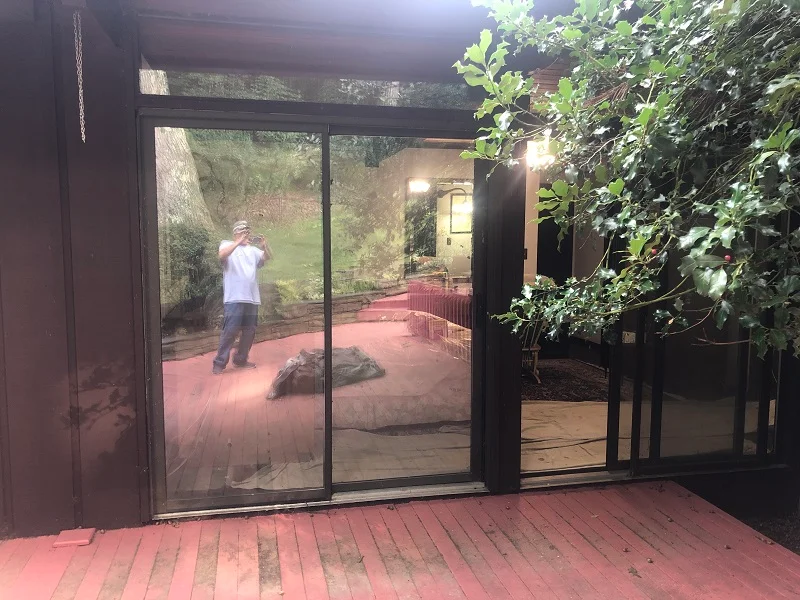 Brown aluminium patio doors need replacement